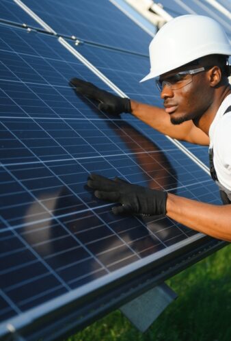 African,American,Engineer,Maintaining,Solar,Cell,Panels.,Technician,Working,Outdoor